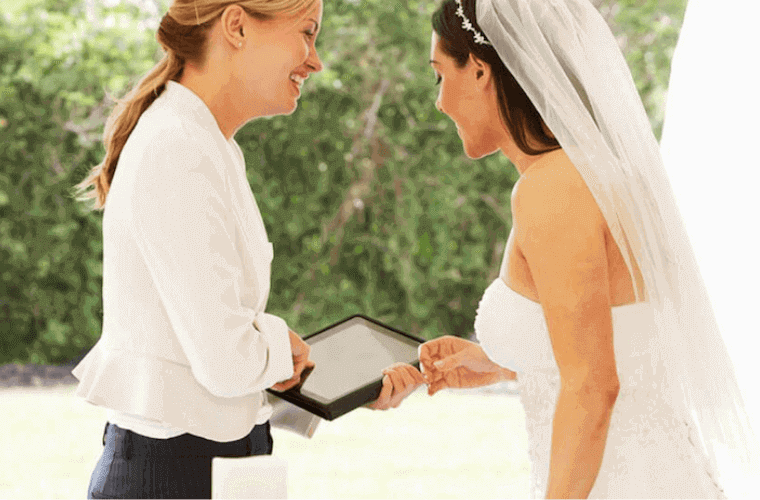 a bride talking to a wedding coordinator 