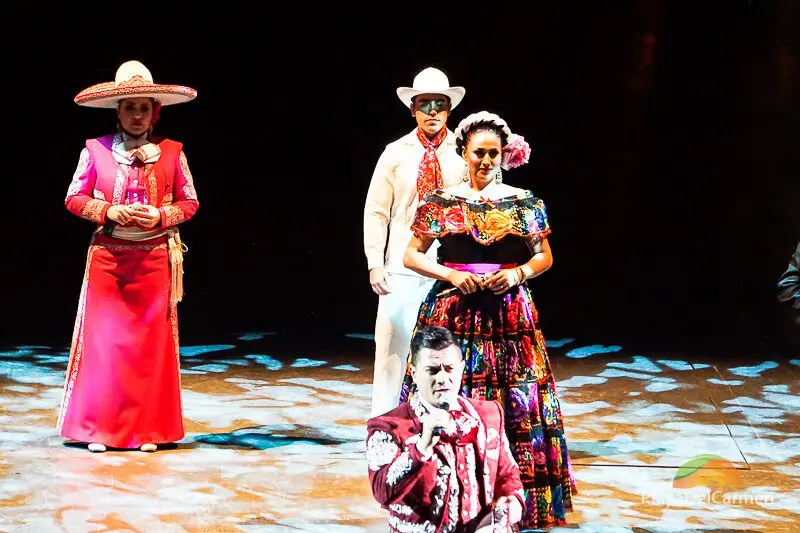 People performing in colorful dresses at Spectacular Mexico at Xcaret