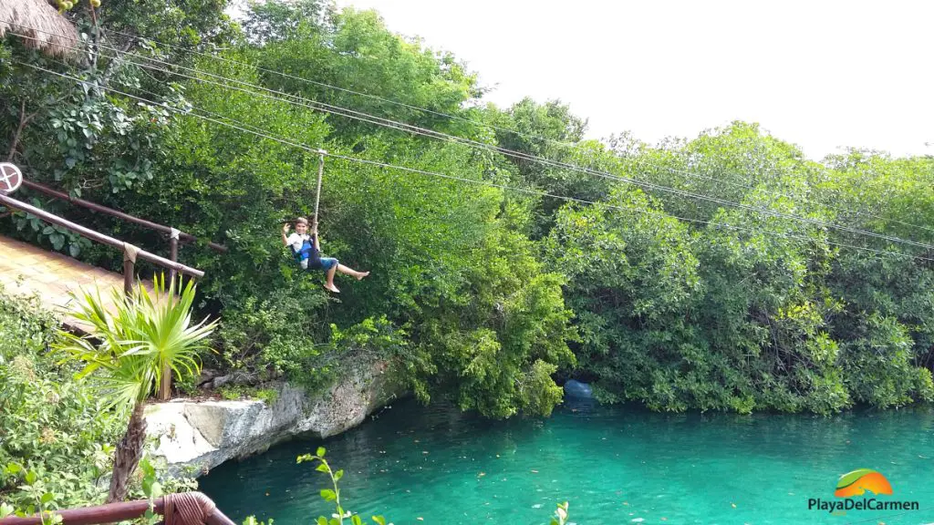 Person zip lining at xel ha zip line