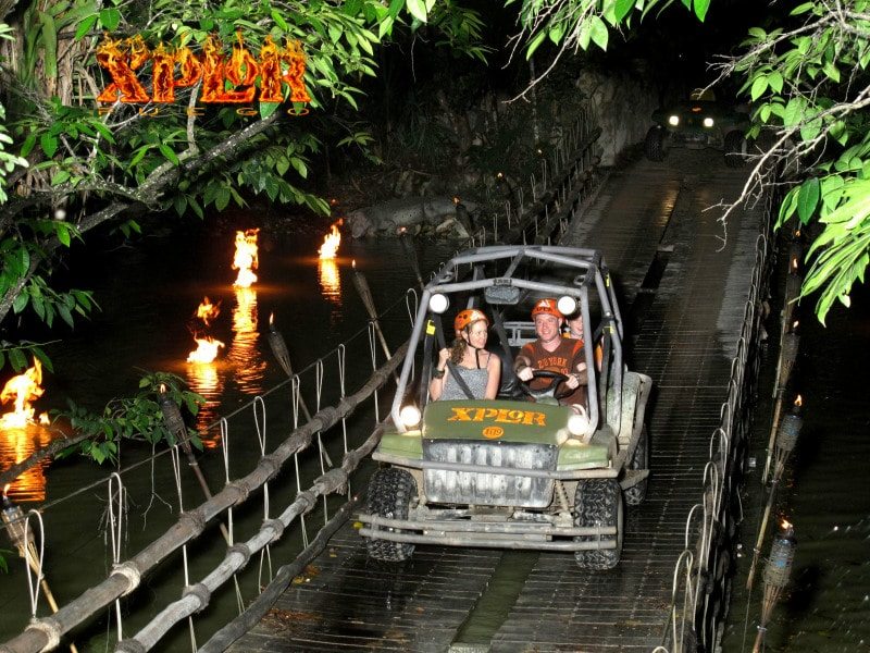 Couple swimming in cave at Xplor Fuego