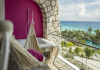 hammocks outside rooms at  hotel xcaret